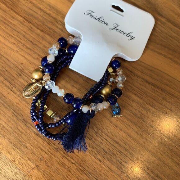 New, bundle of 3 packs of 6 strands each, beads and charms on stretch chord - Picture 9 of 15